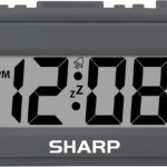 Sharp Digital Alarm Clock  Tactile Plastic Case with Soft Rubberized Finish - Battery Operated  Blue Backlight on Demand  Ascending Alarm  Easy to Use  Charcoal Black